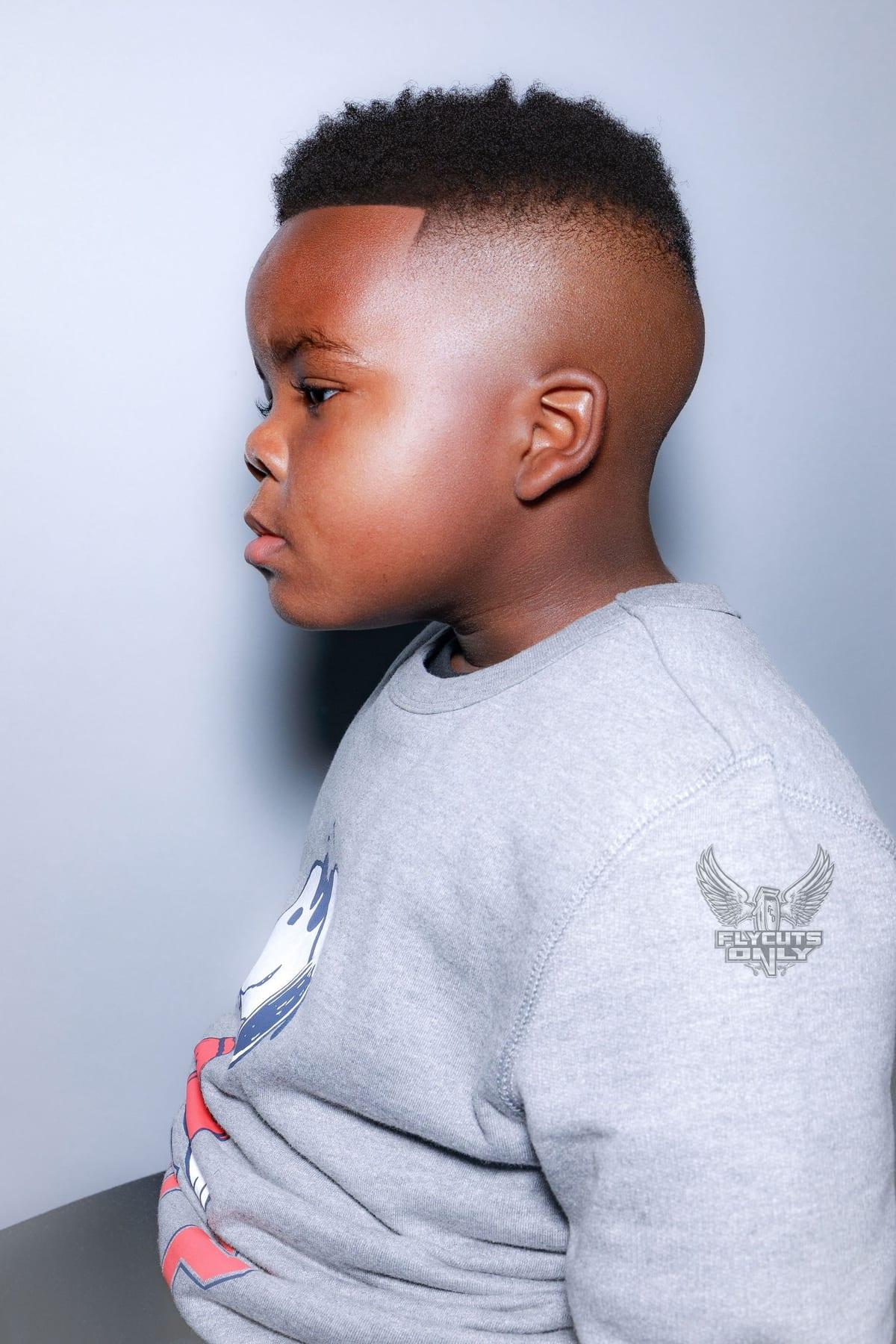 Studio profile of a young client after a burst fade