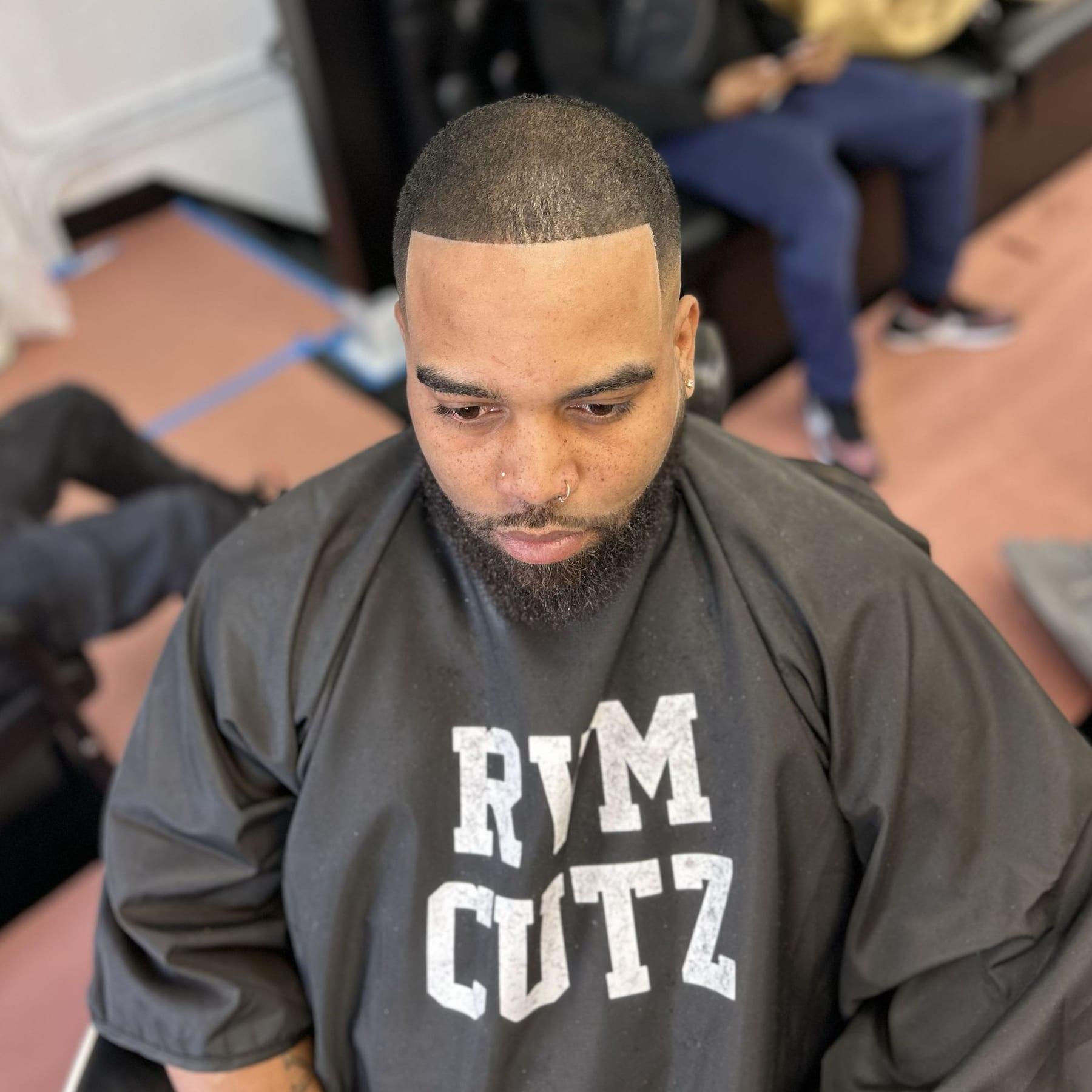 Square line up with a full beard, cut at FLYCUTS0NLY
